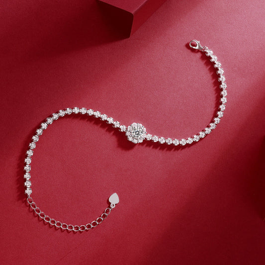 Pearl bracelet with a clasp on a red background